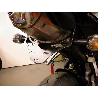 Conversion kit for license plate holders of all CBR 600 RR 2003-2006 and CBR 1000 RR `04-`07, suitable for original indicators or mini indicators (e.g. KELLERMANN), incl. LED tail light (with integrated license plate illumination) and mounting instruct…